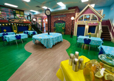 A picture of the Kids Junction Square classroom with lofts and thematic decor throughout the room.